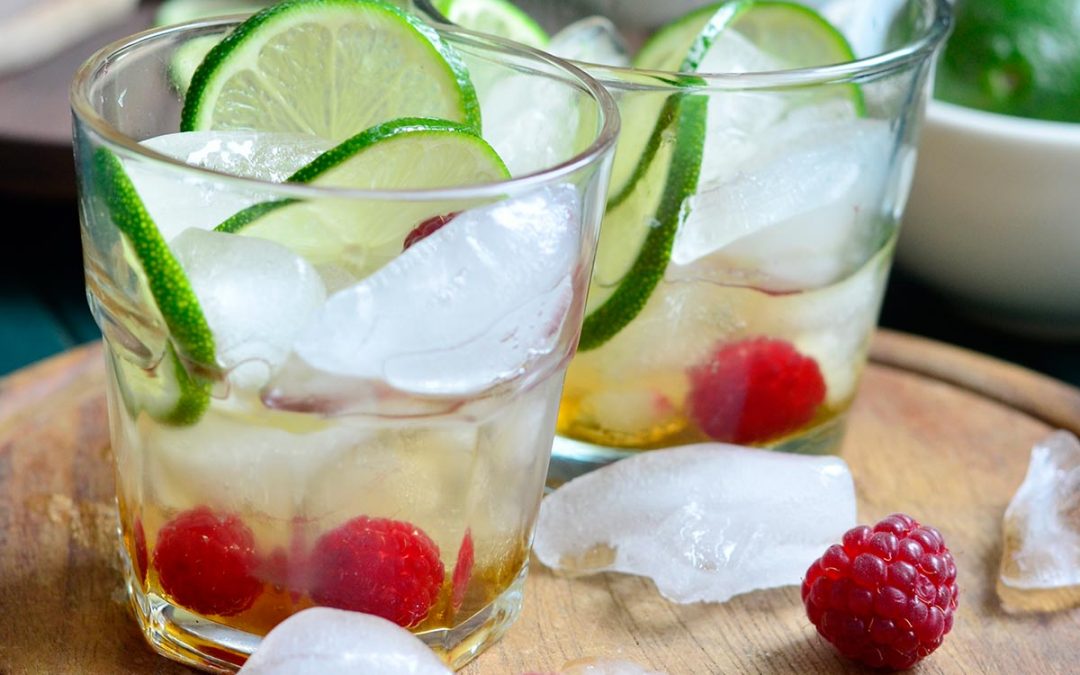 Infused Maple and Rum Cocktail with Lime and Raspberries