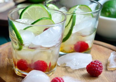 Infused Maple and Rum Cocktail with Lime and Raspberries